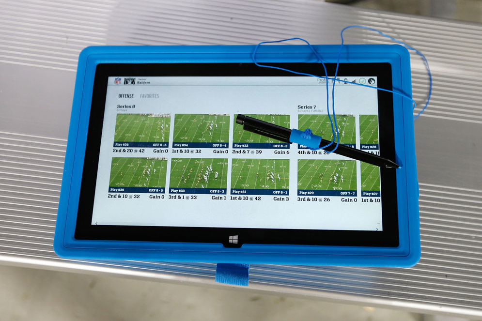 Microsoft Surface Pro tablets offer coaches immediate and dynamic options for analyzing their opponents&#x2019; strategy and formations during a game.&#xA0;(AP Photo/Scott Boehm)
