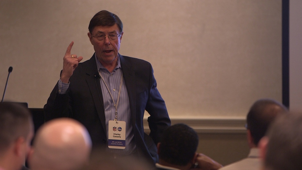 Charley Casserly, NFL Network analyst and former NFL general manager addresses attendees at the 2014 NFL-NCAA Coaches Academy.
