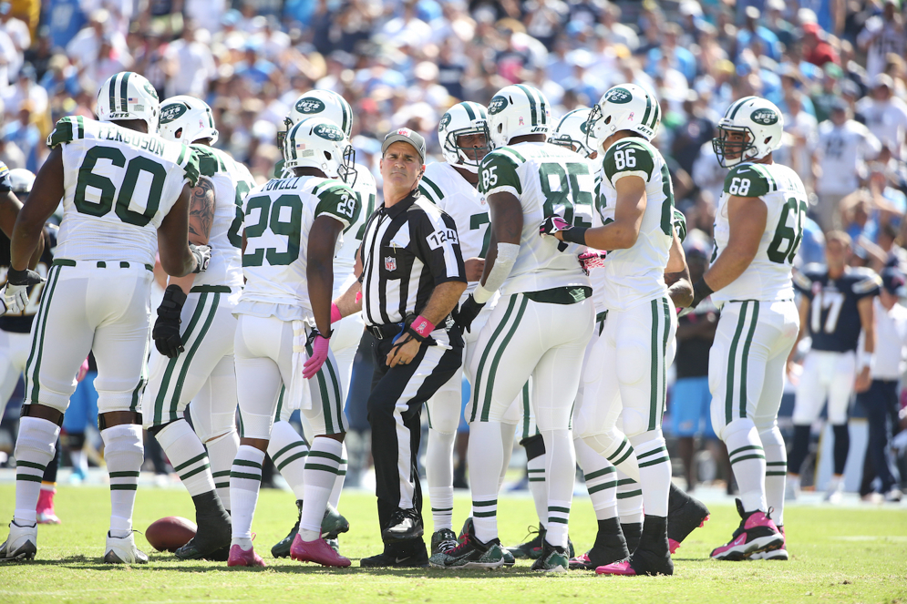 Umpire Carl Paganelli takes his position in the offensive backfield during a 2014 NFL game between the San Diego Chargers and the New York Jets. Starting in 2015, umpires will remain in the offensive backfield on plays inside the defense&#x2019;s 5-yard line moving toward the end zone. (AP Photo/Tom Hauck)