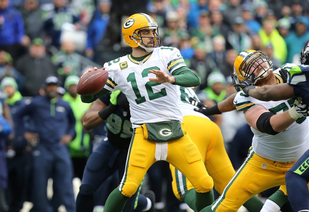 Green Bay Packers quarterback Aaron Rodgers throws a pass during the NFC Championship game against the Seattle Seahawks at CenturyLink Field on Sunday, January 18, 2015 in Seattle, WA. (AP Photo/Todd Rosenberg).