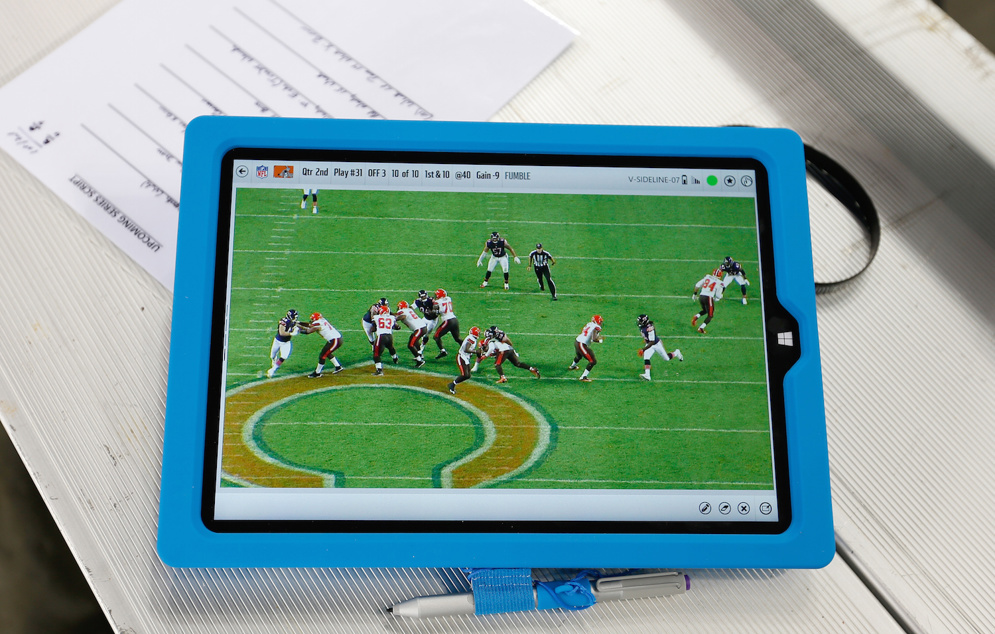 Coaches can use Microsoft Surface tablets to zoom in on high-resolution color images instead of showing players static black-and-white photos.&#160;(Scott Boehm via AP)