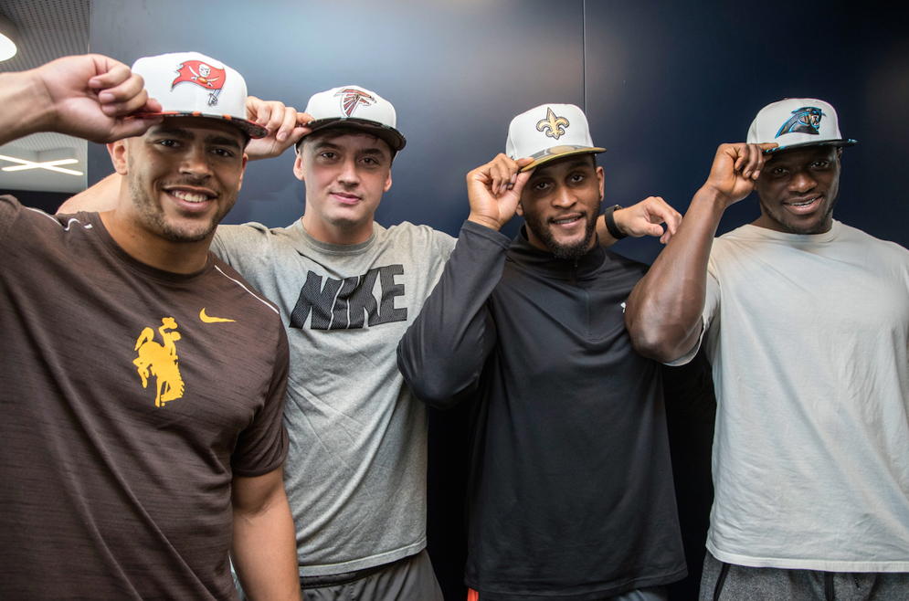 (L-R) Linebacker Eric Nzeocha, tight end Alex Gray, defensive end Alex Jenkins, and defensive end Efe Obada pose for a photo after being selected by the Tampa Bay Buccaneers, Atlanta Falcons, New Orleans Saints and Carolina Panthers as part of the 2017 International Player Pathway Program on Wednesday, May 24, 2017 in London. (Jed Leicester via AP)