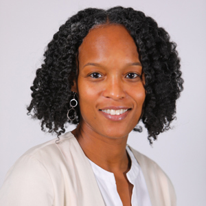 A headshot of Nyaka NiiLampti, Vice Present of Wellness and Clinical Services.