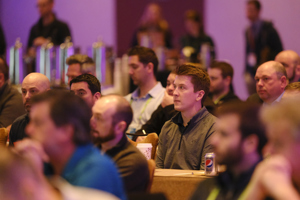 A crowd sits in the audience during the NFL Big Data Bowl.