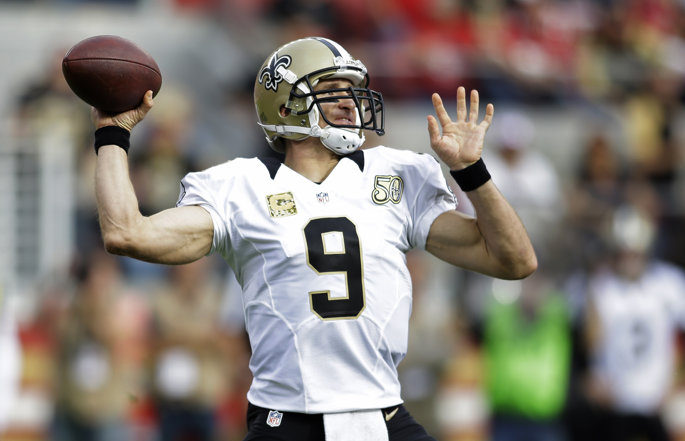 Former New Orleans Saints quarterback Drew Brees passes the football.